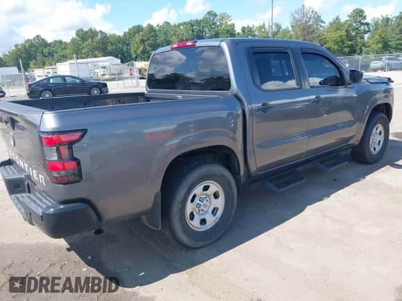 2023 Nissan Frontier Pro-4X with VIN 1N6ED1EK8PN616467, listed as a IAAI auction lot 43165401 with 20,003 mi miles and . Bid and sale history available at DreamBid. Image 4.