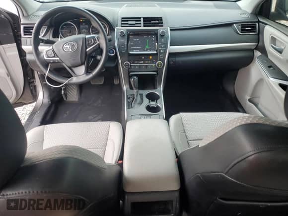 2015 Toyota Camry LE с VIN 4T1BD1FKXFU169791, выставлен на аукционе Copart как лот 71256235 с пробегом 94 734 миль миль и Списание • Salvage title. История ставок и продаж доступна на DreamBid. Изображение 8.