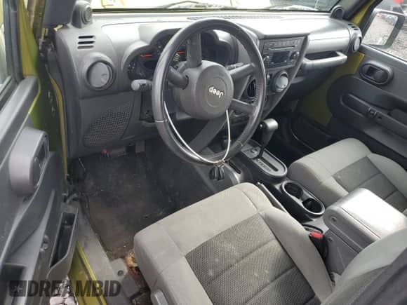 2008 Jeep Wrangler X z VIN 1J4FA241X8L512892, wystawiony jako Copart lot #82195025 z przebiegiem Nie podano mil oraz Czysty tytuł • Clean title. Historia ofert i sprzedaży dostępna na DreamBid. Obrazek 8.