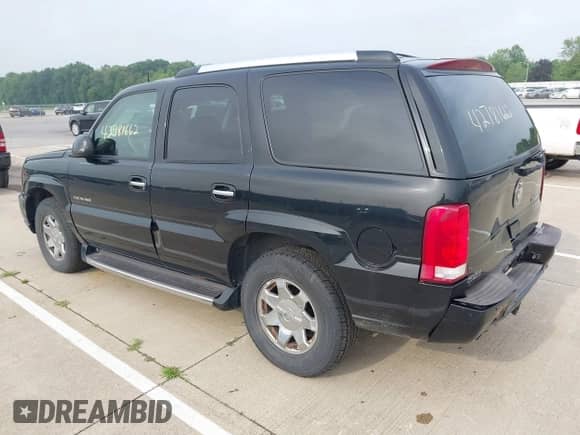 2004 Cadillac Escalade z VIN 1GYEK63N14R219216, wystawiony jako IAAI lot #42781662 z przebiegiem 208 145 mil mil oraz . Historia ofert i sprzedaży dostępna na DreamBid. Obrazek 3.