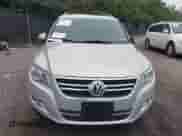 2011 Volkswagen Tiguan S with VIN WVGBV7AX0BW514599, listed as a IAAI auction lot 43051133 with 124,921 mi miles and . Bid and sale history available at DreamBid. Image 6.