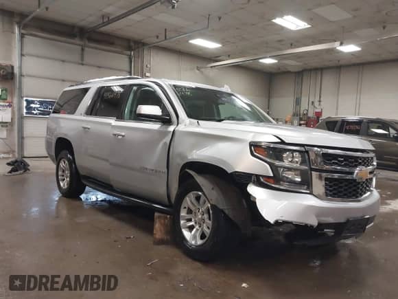 2019 Chevrolet Suburban LT with VIN 1GNSKHKC4KR289284, listed as a IAAI auction lot 41366478 with 175,690 mi miles and . Bid and sale history available at DreamBid. Image 1.