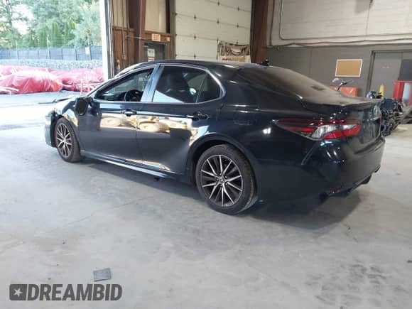 2021 Toyota Camry SE z VIN 4T1G11AKXMU471598, wystawiony jako IAAI lot #43060273 z przebiegiem 87 450 mil mil oraz . Historia ofert i sprzedaży dostępna na DreamBid. Obrazek 3.