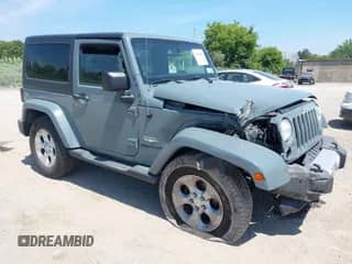 2014 Jeep Wrangler Sahara z VIN 1C4AJWBGXEL190118, wystawiony jako IAAI lot #42818804 z przebiegiem 113 855 mil mil oraz . Historia ofert i sprzedaży dostępna na DreamBid. Obrazek 1.