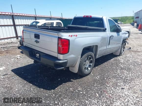2014 Chevrolet Silverado 1500 Work Truck with VIN 1GCNKPEC8EZ277428, listed as a IAAI auction lot 42038595 with 132,179 mi miles and . Bid and sale history available at DreamBid. Image 4.
