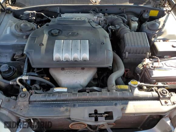 2002 Hyundai Sonata z VIN KMHWF25S32A594803, wystawiony jako Copart lot #80190965 z przebiegiem 184 450 mil mil oraz Szkoda całkowita • Salvage title. Historia ofert i sprzedaży dostępna na DreamBid. Obrazek 11.