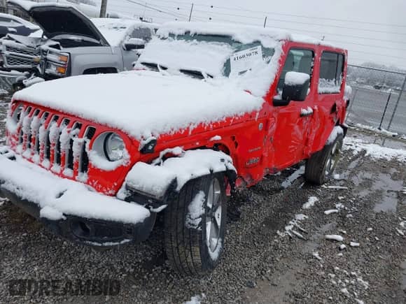 2021 Jeep Wrangler Unlimited Sahara Altitude z VIN 1C4HJXENXMW592247, wystawiony jako IAAI lot #41603078 z przebiegiem 71 751 mil mil oraz . Historia ofert i sprzedaży dostępna na DreamBid. Obrazek 19.