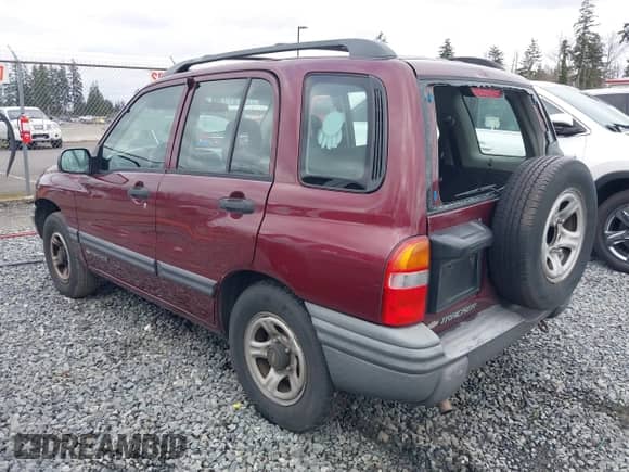 2002 Chevrolet Tracker with VIN 2CNBJ13C626925583, listed as a IAAI auction lot 41636212 with 181,341 mi miles and . Bid and sale history available at DreamBid. Image 3.