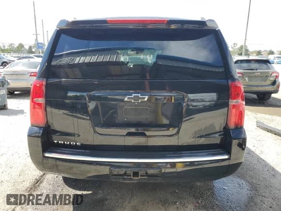 2015 Chevrolet Tahoe LTZ with VIN 1GNSKCKC3FR216657, listed as a Copart auction lot 85706835 with 195,674 mi miles and Salvage title. Bid and sale history available at DreamBid. Image 6.