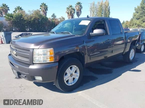 2010 Chevrolet Silverado 1500 LTZ with VIN 3GCRKTE39AG107745, listed as a IAAI auction lot 43506964 with 119,063 mi miles and . Bid and sale history available at DreamBid. Image 2.