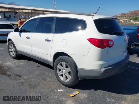 2012 Chevrolet Traverse 1LT z VIN 1GNKRGED6CJ253414, wystawiony jako IAAI lot #43337610 z przebiegiem 212 522 mil mil oraz . Historia ofert i sprzedaży dostępna na DreamBid. Obrazek 3.