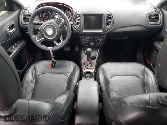 2017 Jeep Compass Trailhawk with VIN 3C4NJDDB0HT659636, listed as a Copart auction lot 62021725 with 34,092 mi miles and Salvage title. Bid and sale history available at DreamBid. Image 8.