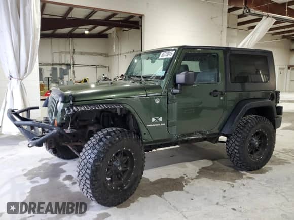 2009 Jeep Wrangler X с VIN 1J4FA24169L708281, выставлен на аукционе Copart как лот 85533845 с пробегом 83 553 миль миль и Списание • Salvage title. История ставок и продаж доступна на DreamBid. Изображение 1.