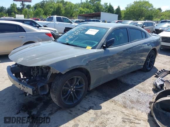 2018 Dodge Charger SXT Plus with VIN 2C3CDXHG1JH167383, listed as a IAAI auction lot 42826149 with 122,871 mi miles and . Bid and sale history available at DreamBid. Image 22.