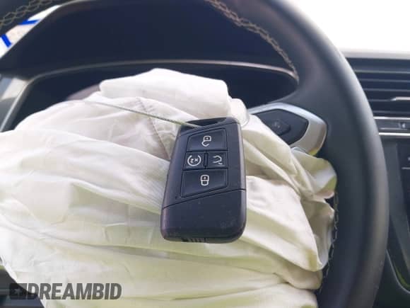 2023 Volkswagen Tiguan SE with VIN 3VV3B7AX4PM095392, listed as a IAAI auction lot 42830053 with 14,674 mi miles and . Bid and sale history available at DreamBid. Image 11.