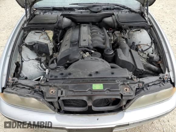 1998 BMW 5 Series 528i с VIN WBADD5326WBV56081, выставлен на аукционе Copart как лот 73791134 с пробегом 146 776 миль миль и На запчасти • Non repairable. История ставок и продаж доступна на DreamBid. Изображение 11.