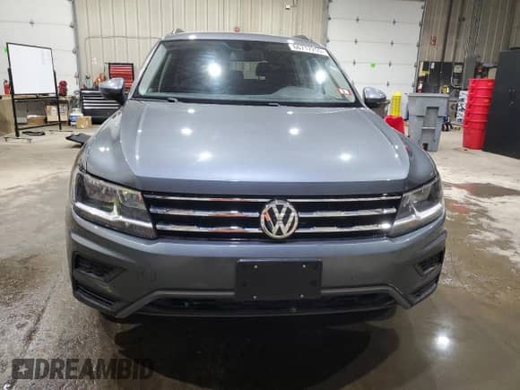 2020 Volkswagen Tiguan SE с VIN 3VV2B7AX1LM116074, выставлен на аукционе Copart как лот 66717255 с пробегом 76 400 миль миль и Списание • Salvage title. История ставок и продаж доступна на DreamBid. Изображение 5.