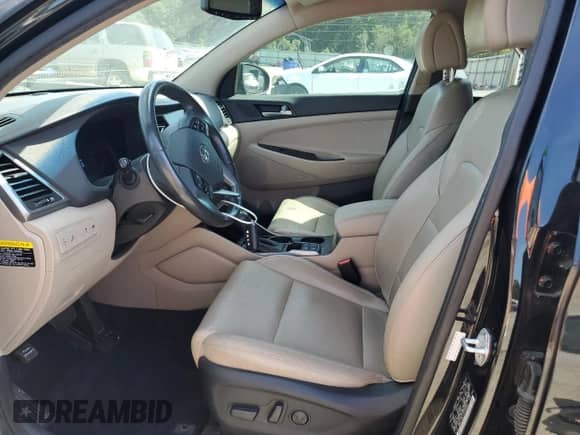 2018 Hyundai Tucson Value with VIN KM8J33A27JU745640, listed as a Copart auction lot 71830205 with 118,965 mi miles and Salvage title. Bid and sale history available at DreamBid. Image 7.