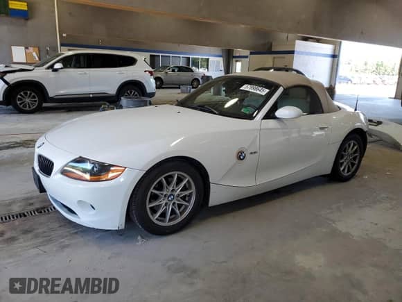 2003 BMW Z4 2.5i with VIN 4USBT33403LS47483, listed as a Copart auction lot 57998645 with 111,534 mi miles and Clean title. Bid and sale history available at DreamBid. Image 1.