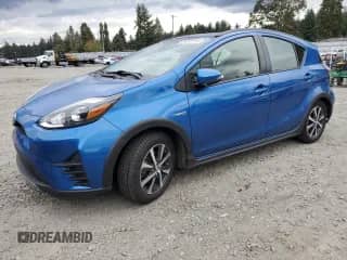 2018 Toyota Prius Two z VIN JTDKDTB33J1601808, wystawiony jako Copart lot #86331275 z przebiegiem 57 961 mil mil oraz Szkoda całkowita • Salvage title. Historia ofert i sprzedaży dostępna na DreamBid. Obrazek 1.