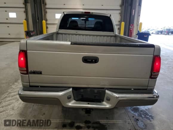 2001 Dodge Dakota с VIN 1B7GL22X01S241896, выставлен на аукционе Copart как лот 80546295 с пробегом 152 001 миль миль и Списание • Salvage title. История ставок и продаж доступна на DreamBid. Изображение 6.