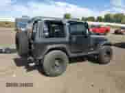 1998 Jeep Wrangler Sport z VIN 1J4FY19SXWP734488, wystawiony jako Copart lot #81896775 z przebiegiem 180 236 mil mil oraz Czysty tytuł • Clean title. Historia ofert i sprzedaży dostępna na DreamBid. Obrazek 3.