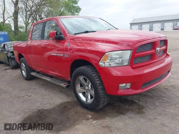 2011 Ram 1500 SLT with VIN 1D7RV1CTXBS557421, listed as a IAAI auction lot 42149415 with 119,968 mi miles and . Bid and sale history available at DreamBid. Image 1.
