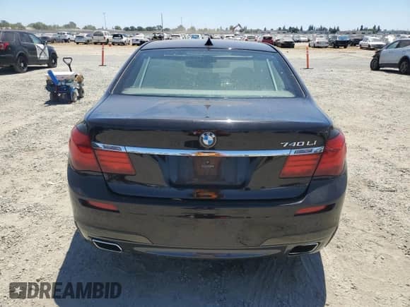 2014 BMW 7 Series 740Li with VIN WBAYE4C58ED137901, listed as a Copart auction lot 61493495 with 206,313 mi miles and Salvage title. Bid and sale history available at DreamBid. Image 6.
