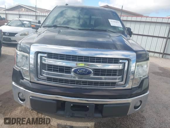 2013 Ford F-150 XL z VIN 1FTFW1CF3DKF93913, wystawiony jako IAAI lot #43389853 z przebiegiem 119 937 mil mil oraz . Historia ofert i sprzedaży dostępna na DreamBid. Obrazek 12.