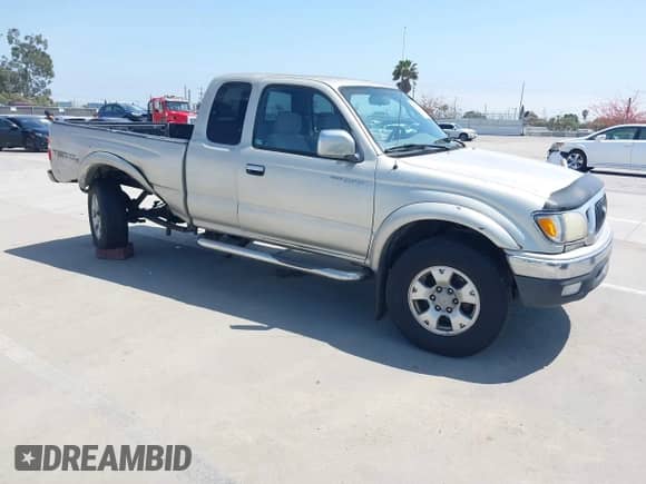 2004 Toyota Tacoma PreRunner z VIN 5TESM92N34Z360203, wystawiony jako IAAI lot #42168622 z przebiegiem 234 157 mil mil oraz . Historia ofert i sprzedaży dostępna na DreamBid. Obrazek 1.