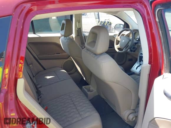 2008 Dodge Caliber SE with VIN 1B3HB28B88D699351, listed as a IAAI auction lot 42828840 with 70,833 mi miles and . Bid and sale history available at DreamBid. Image 8.