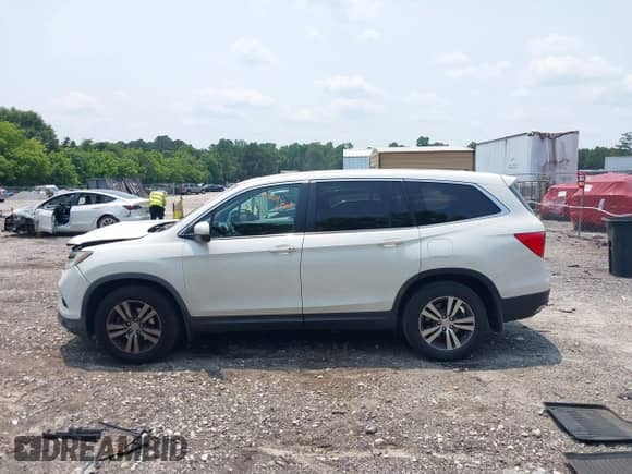 2017 Honda Pilot EX-L with VIN 5FNYF5H56HB003982, listed as a IAAI auction lot 42402297 with 99,485 mi miles and . Bid and sale history available at DreamBid. Image 15.