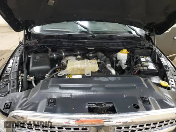 2014 Ram 1500 Laramie z VIN 1C6RR7NM0ES402167, wystawiony jako Copart lot #67562435 z przebiegiem 90 335 mil mil oraz Czysty tytuł • Clean title. Historia ofert i sprzedaży dostępna na DreamBid. Obrazek 11.