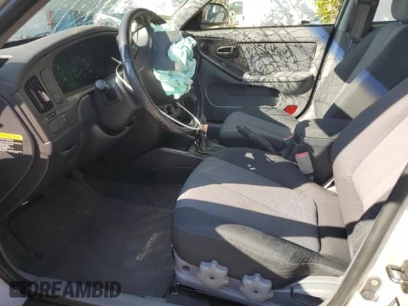 2005 Hyundai Elantra GLS with VIN KMHDN56D85U158074, listed as a Copart auction lot 83863435 with 130,587 mi miles and Salvage title. Bid and sale history available at DreamBid. Image 7.