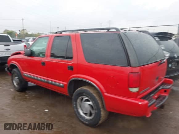 2001 Chevrolet Blazer LT with VIN 1GNDT13W412220057, listed as a IAAI auction lot 43255739 with Not provided miles and . Bid and sale history available at DreamBid. Image 3.