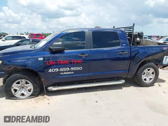 2007 Toyota Tundra SR5 z VIN 5TBET54107S454598, wystawiony jako IAAI lot #42558681 z przebiegiem 309 838 mil mil oraz . Historia ofert i sprzedaży dostępna na DreamBid. Obrazek 15.