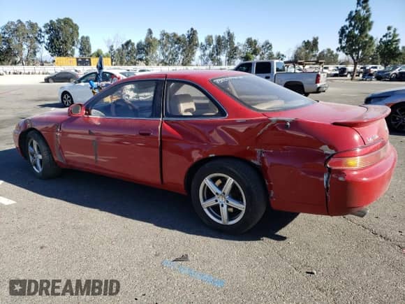 1995 Lexus SC 400 with VIN JT8UZ30C9S0045829, listed as a Copart auction lot 74985563 with 137,372 mi miles and Salvage title. Bid and sale history available at DreamBid. Image 2.