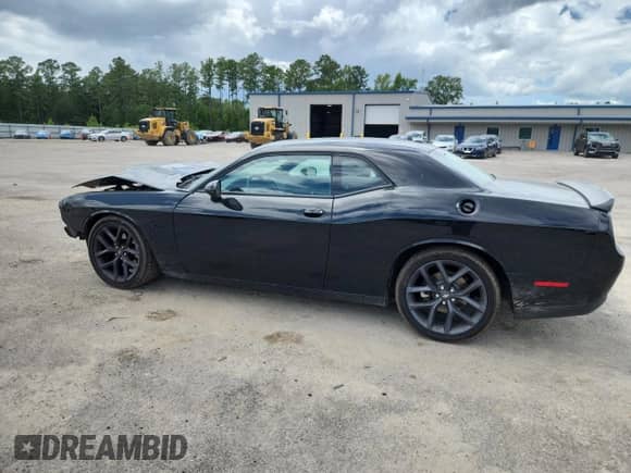 2023 Dodge Challenger R/T with VIN 2C3CDZBT8PH669642, listed as a Copart auction lot 64937035 with 26,096 mi miles and Salvage title. Bid and sale history available at DreamBid. Image 2.