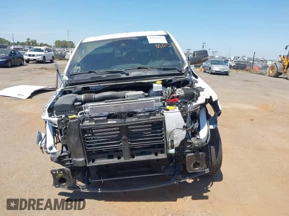 2023 Ram 1500 Big Horn with VIN 1C6SRFMTXPN670827, listed as a IAAI auction lot 42626215 with 22,172 mi miles and . Bid and sale history available at DreamBid. Image 13.