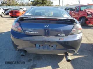 2008 Hyundai Tiburon GS z VIN KMHHM66D98U283891, wystawiony jako Copart lot #79935854 z przebiegiem 205 482 mil mil oraz Szkoda całkowita • Salvage title. Historia ofert i sprzedaży dostępna na DreamBid. Obrazek 6.