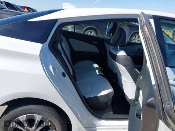 2021 Toyota Prius LE with VIN JTDL9MFU8M3029027, listed as a IAAI auction lot 43354130 with 66,497 mi miles and . Bid and sale history available at DreamBid. Image 8.