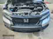 2020 Honda Passport Touring z VIN 5FNYF8H9XLB019275, wystawiony jako Copart lot #63085665 z przebiegiem 54 081 mil mil oraz Szkoda całkowita • Salvage title. Historia ofert i sprzedaży dostępna na DreamBid. Obrazek 12.