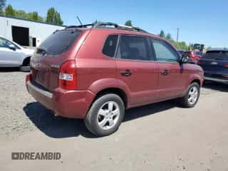 2005 Hyundai Tucson GL with VIN KM8JM12B75U100184, listed as a Copart auction lot 66578575 with 212,373 mi miles and Salvage title. Bid and sale history available at DreamBid. Image 3.