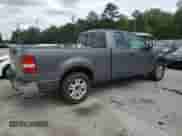 2007 Ford F-150 STX with VIN 1FTRX12W57NA42056, listed as a Copart auction lot 54569255 with 257,357 mi miles and Clean title. Bid and sale history available at DreamBid. Image 3.