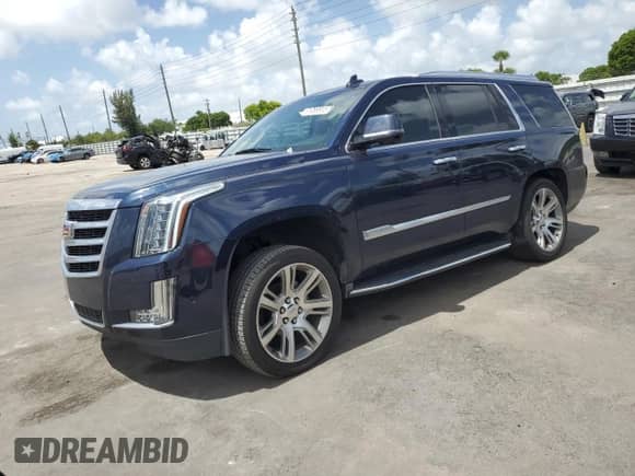 2018 Cadillac Escalade Luxury with VIN 1GYS3BKJ7JR260064, listed as a Copart auction lot 61089915 with 112,720 mi miles and Salvage title. Bid and sale history available at DreamBid. Image 1.