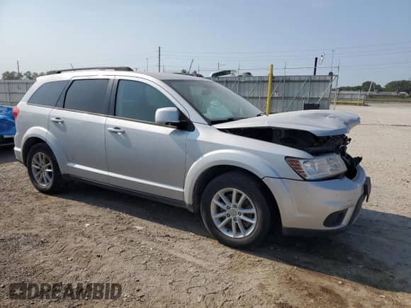 2014 Dodge Journey SXT with VIN 3C4PDCBG2ET229756, listed as a Copart auction lot 71250305 with 171,998 mi miles and Salvage title. Bid and sale history available at DreamBid. Image 4.