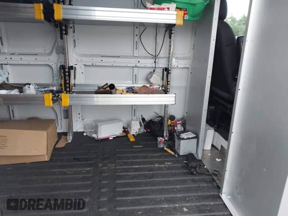 2025 Ram ProMaster Cargo Tradesman with VIN 3C6MRVHG3SE529997, listed as a IAAI auction lot 42672514 with 13,630 mi miles and . Bid and sale history available at DreamBid. Image 8.