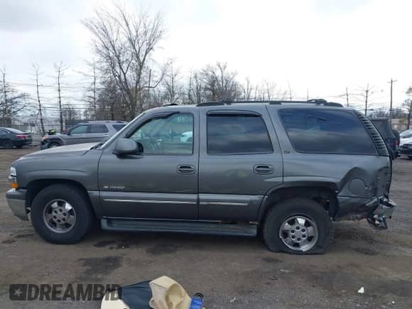 2000 Chevrolet Tahoe LS with VIN 1GNEK13T0YJ164874, listed as a IAAI auction lot 41893502 with 270,791 mi miles and . Bid and sale history available at DreamBid. Image 14.