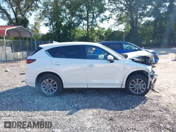 2025 Mazda CX-5 S Select с VIN JM3KFBBL5S0636109, выставлен на аукционе IAAI как лот 43105213 с пробегом 13 450 миль миль и . История ставок и продаж доступна на DreamBid. Изображение 14.