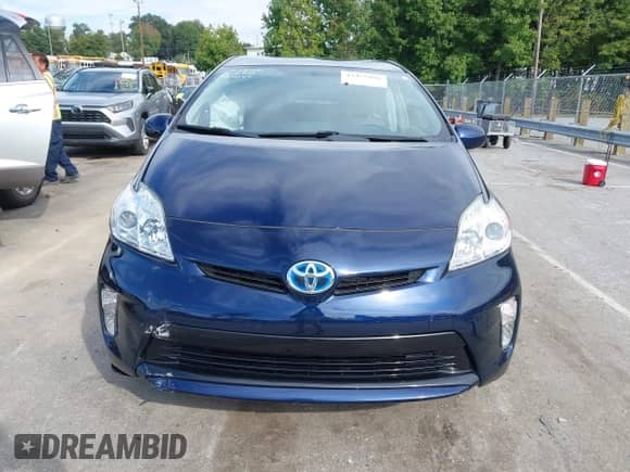 2015 Toyota Prius Four z VIN JTDKN3DU1F1949780, wystawiony jako IAAI lot #43356956 z przebiegiem 132 853 mil mil oraz . Historia ofert i sprzedaży dostępna na DreamBid. Obrazek 13.
